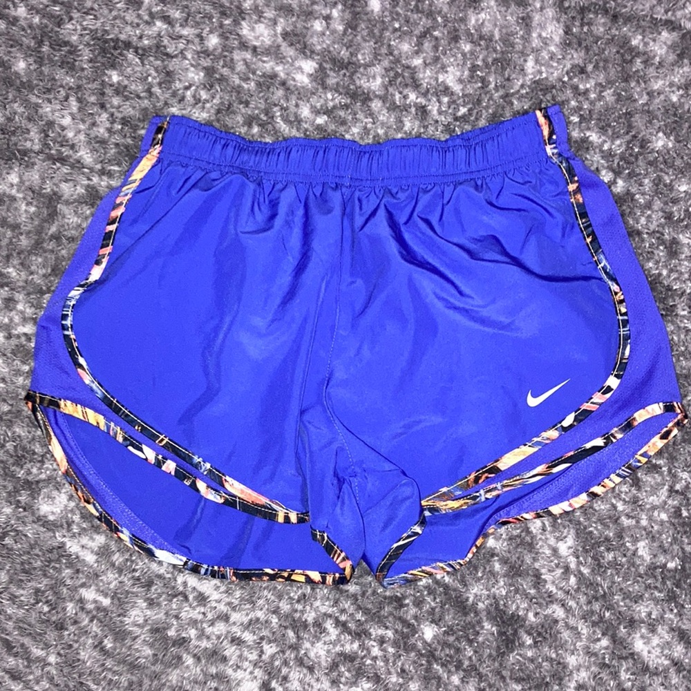 Nike athletic shorts, color purple, woman’s size medium